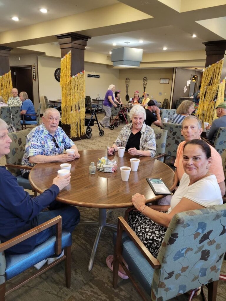 Residents gather for conversation and refreshments during a community social at Traditions of Beavercreek.
